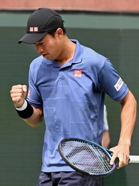 Tenista japonês Kei Nishikori em ação no BNP Paribas Open Tenista japonês Kei Nishikori em ação no BNP Paribas Open