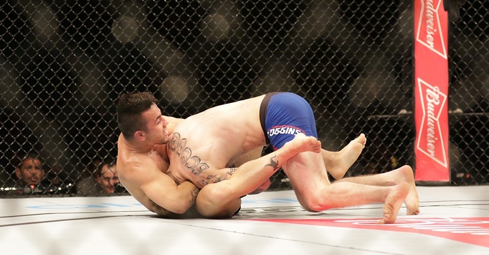 Pelos pesos galos, Pedro Munhoz (Brasila)	derrotou	Justin Scoggins (EUA) no card preliminar - Cleber Yamaguchi/Ag. Fight