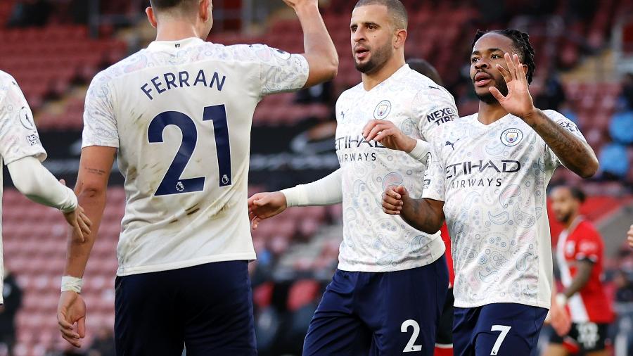 Sterling comemora o único gol do Manchester City na partida contra o Southampton - ADRIAN DENNIS/AFP