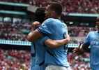 Ederson brilha nos pênaltis, e City é campeão da Supercopa sobre United - HENRY NICHOLLS / AFP