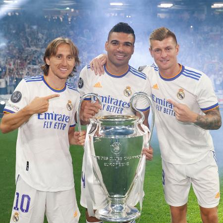 Modric, Casemiro e Kroos celebram título da Champions League Modric, Casemiro e Kroos celebram título da Champions League