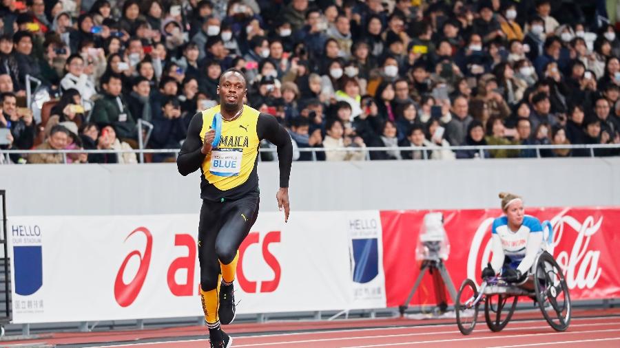 Bolt participa de corrida na inauguração do Estádio Nacional, em Tóquio, que irá sediar as provas de atletismo nos Jogos Olímpicos de Tóquio em 2020 - AFP/Japan Sport Council