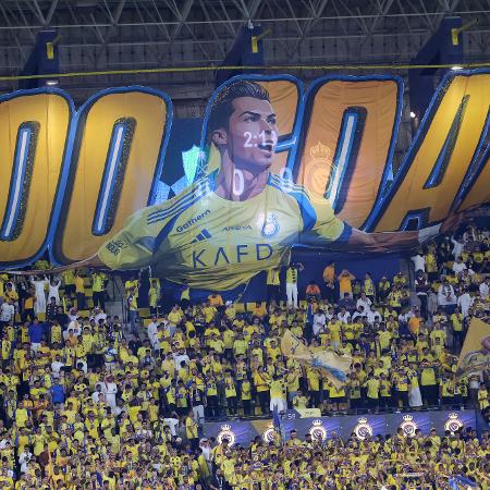 Cristiano Ronaldo foi homenageado pela torcida do Al-Nassr pelos 900 gols na carreira - Fayez NURELDINE / AFP