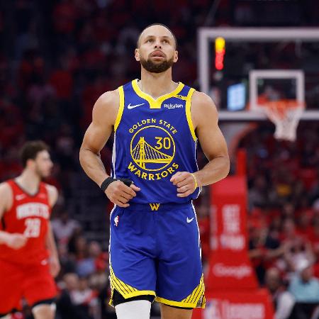 Stephen Curry, dos Warriors, no jogo contra os Rockets, pelos Playoffs da NBA - Tim Warner/AFP