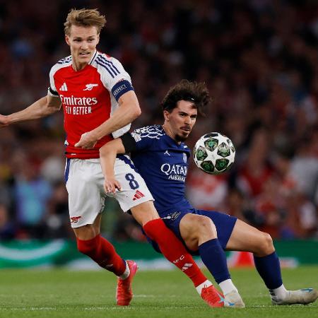 Odegaard x Vitinha em Arsenal x Paris Saint-Germain Odegaard x Vitinha em Arsenal x Paris Saint-Germain