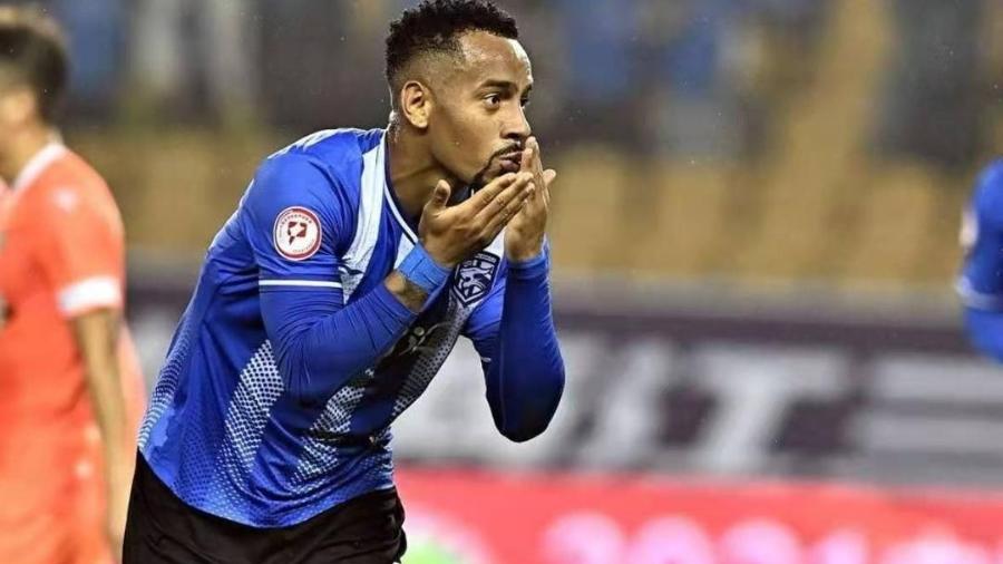 Ademilson, ex-São Paulo, comemora gol pelo Wuhan Three Towns, da China - Divulgação