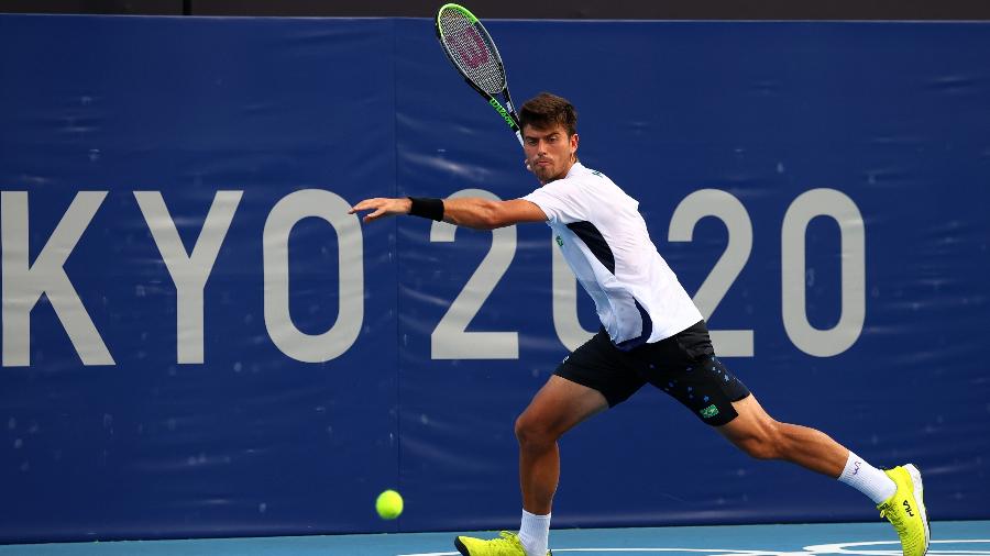 João Menezes em ação contra Marin Cilic em Tóquio - Edgar Su/Reuters