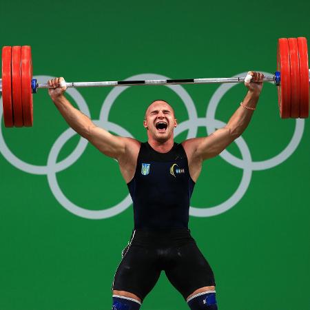 Oleksandr Pielieshenko disputa prova de levantamento de peso nos Jogos Olímpicos do Rio 2016 - Mike Ehrmann/Getty Images