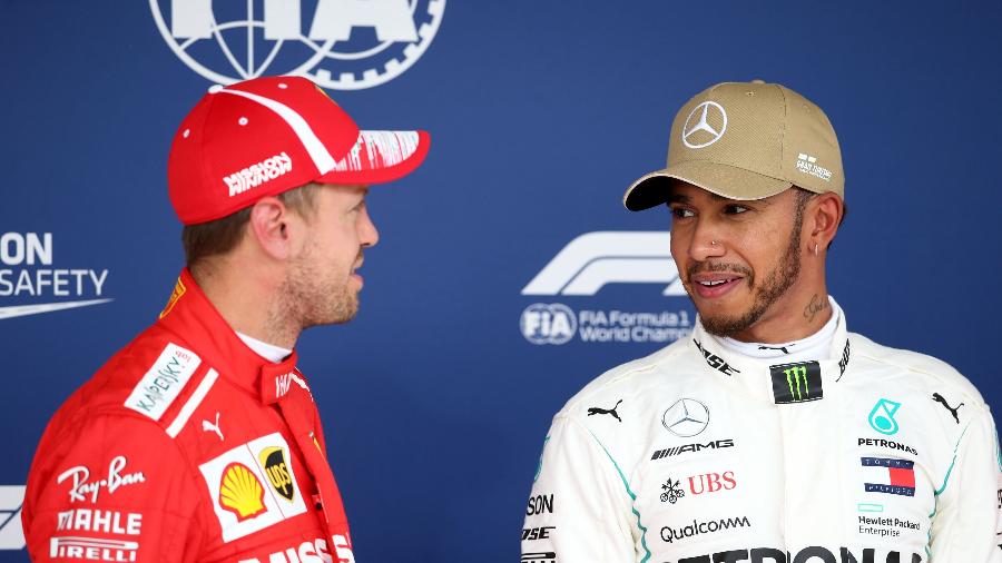 Vettel e Hamilton conversam após treino classificatório do GP dos EUA - Charles Coates/Getty Images/AFP