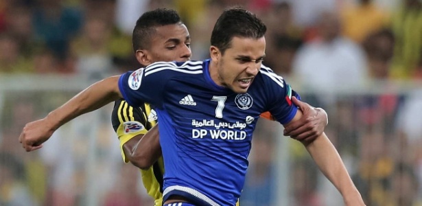 Nilmar disputa bola pelo Al-Nasr pela Liga dos Campeões da Ásia - AFP PHOTO / STRINGER