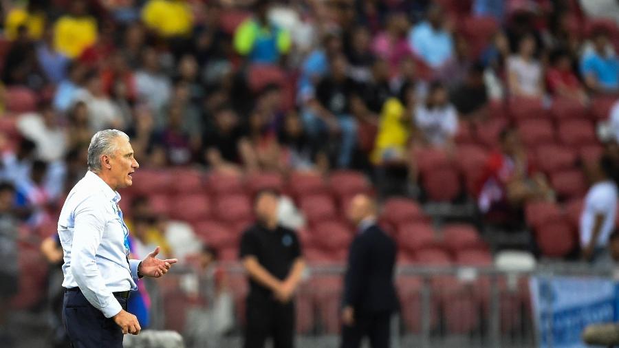Tite falou sobre a qualidade de Messi e a postura que espera da seleção no amistoso - Roslan Rahman/AFP