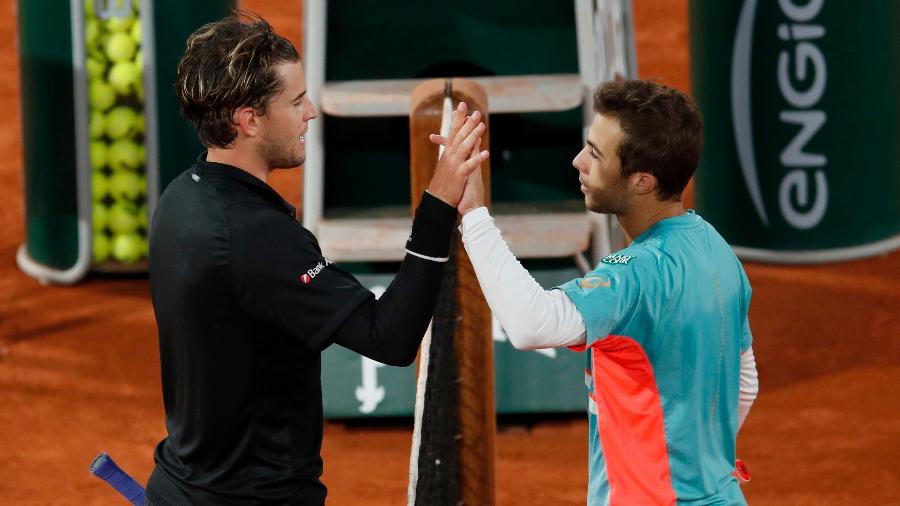 Dominic Thiem (esq.) e Hugo Gaston nas oitavas de final de Roland Garros 2020 - Reuters