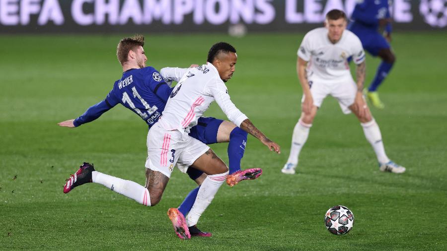 MADRID, SPAIN - APRIL 27 Eder Militao of Real Madrid is challenged by Timo Werner of Chelsea during the UEFA Champions League Semi Final First Leg match between Real Madrid and Chelsea FC at Estadio Alfredo Di Stefano on April 27, 2021 in Madrid, Spain. Sporting stadiums around Spain remain under strict restrictions due to the Coronavirus Pandemic as Government social distancing laws prohibit fans inside venues resulting in games being played behind closed doors.  (Photo by Angel Martinez/Getty Images) - Angel Martinez/Getty Images