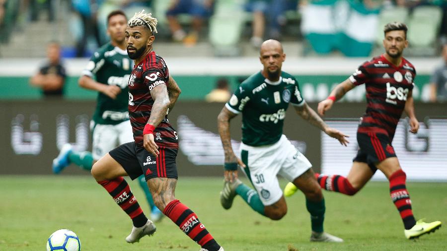 Duelo entre Palmeiras e Flamengo pode não acontecer neste fim de semana devido ao surto de covid-19 no clube carioca - Wagner Meier/Getty Images
