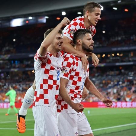 Bruno Petkovic, da Croácia, comemora após marcar na prorrogação contra a Holanda, pela semifinal da Liga das Nações - Christof Koepsel/Getty