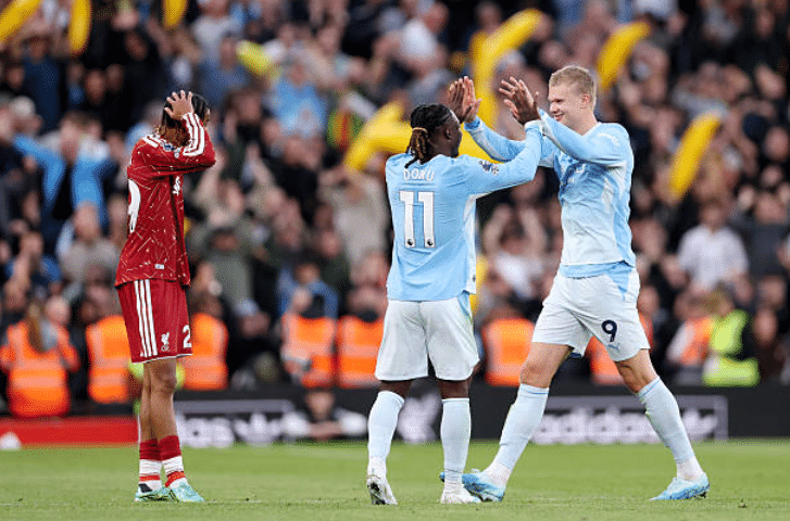 Doku e Haaland comemorando gol contra o Liverpool, pela Premier League - undefined