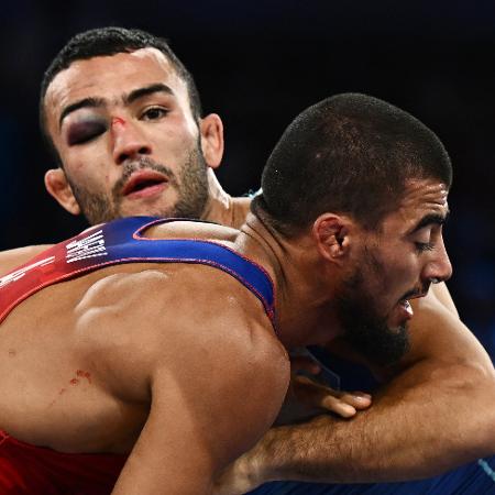 Parviz Nasibov, da Ucrânia, durante luta contra Hasrat Jafarov, pela semifinal da luta greco-romana