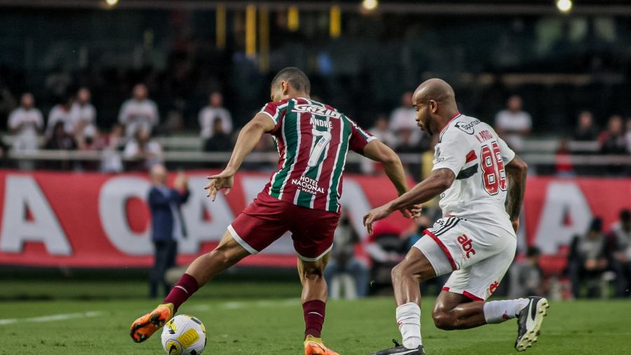 André e Patrick em ação durante jogo entre São Paulo e Fluminense, pelo Brasileirão - Guilherme Drovas/AGIF