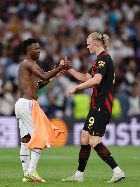 Vinicius Jr, do Real Madrid, e Haaland, do Manchester City, se enfrentam hoje pelas semifinais da Champions - Manuel Reino Berengui/DeFodi Images via Getty Images