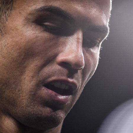 Cristiano Ronaldo deixou o banco de reservas antes do fim de Manchester United x Tottenham - Oli SCARFF / AFP