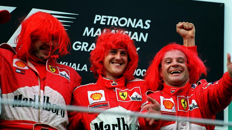 Ross Brawn ao lado de Michael Schumacher e Rubens Barrichello no pódio da F-1: elogios à personalidade do alemão - John Marsh/EMPICS via Getty Images