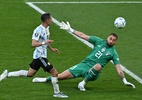 Vitória sobre a Itália confirma Argentina na lista de favoritas para a Copa - Ben Stansall / AFP
