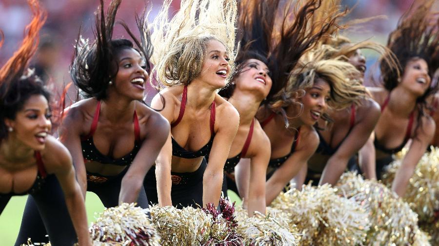 Cheerleaders do Washington Redskins em ação durante jogo contra o Cincinnati Bengals - Patrick Smith/Getty Images/AFP