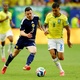Por que o Brasil est&aacute; jogando com mei&otilde;es e shorts brancos contra a Esc&oacute;cia?