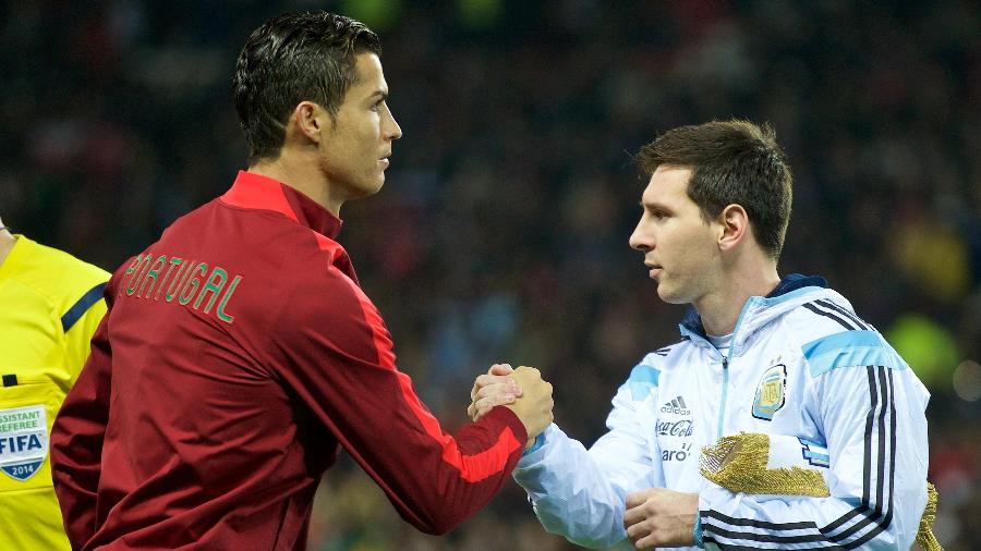Cristiano Ronaldo e Lionel Messi, os dois gênios do futebol moderno - David Rawcliffe/Anadolu Agency/Getty Images
