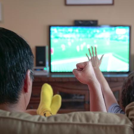 A maioria dos jogadores assiste a jogos de futebol nas folgas - Getty Images/iStockphoto