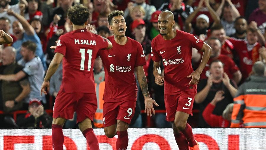 Firmino comemora gol pelo Liverpool na partida contra o Newcastle, pelo Inglês - Paul ELLIS / AFP