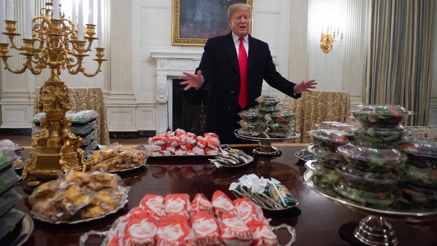 Trump paga pizza e hambúrgueres na Casa Branca devido ao "shutdown" - SAUL LOEB/AFP
