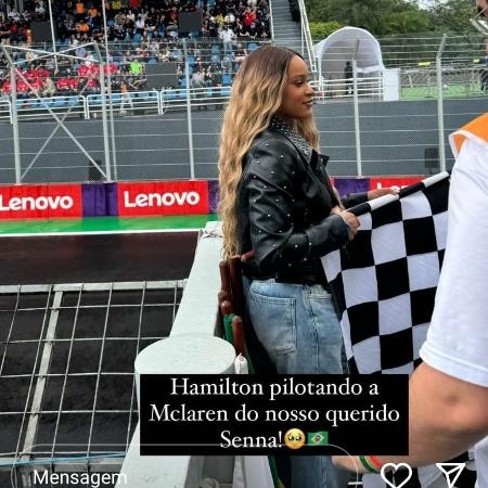 Rebeca Andrade deu a bandeirada na corrida de Lewis Hamilton em homenagem a Ayrton Senna, no GP de São Paulo