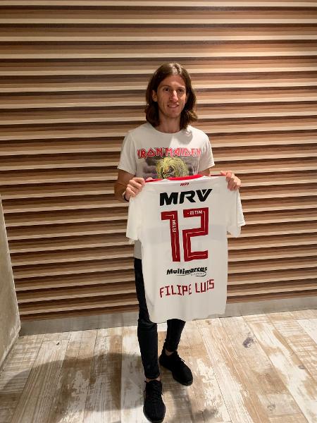 Filipe Luis com a camisa do Flamengo - Divulgação/Flamengo