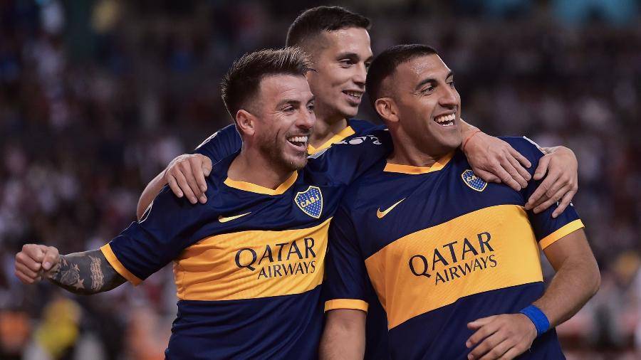 Jogadores do Boca Juniors comemoram vitória sobre a LDU - RODRIGO BUENDIA / AFP
