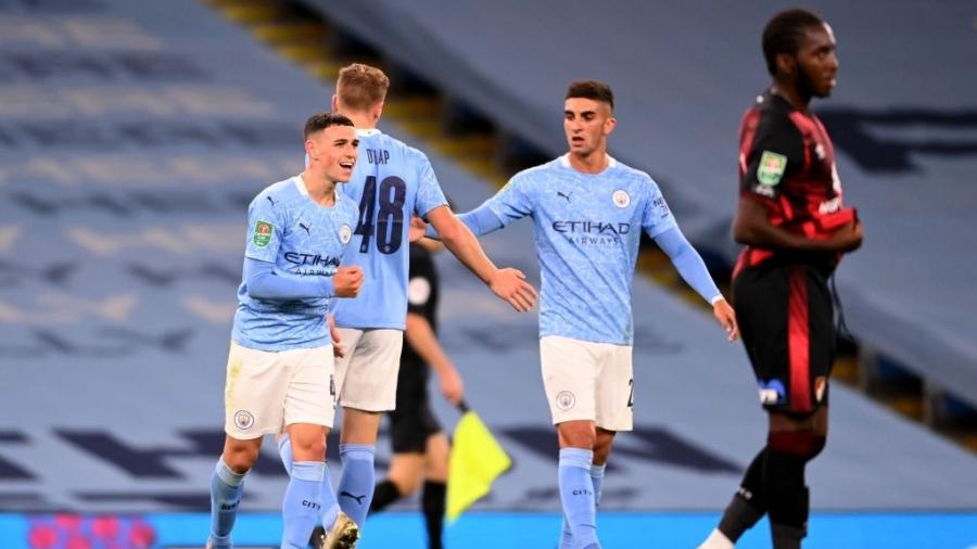 Phil Foden e seus colegas do Manchester City vão receber o time do Arsenal amanhã pelo Inglês - Laurence Griffiths/Getty Images