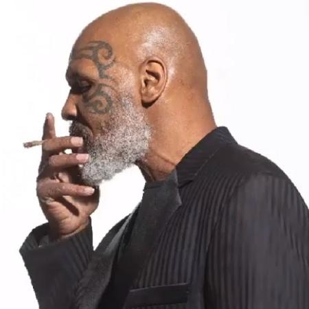 Mike Tyson é flagrado fumando tora de maconha em festival; veja