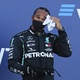 Lewis Hamilton on the podium of the Russian GP after third place in the Sochi race - Kirill Kudryavtsev / Reuters