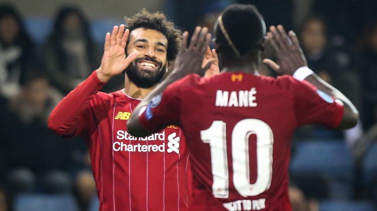 Salah e Man&eacute; s&atilde;o artilheiros, mas tamb&eacute;m ajudam muito na marca&ccedil;&atilde;o - Fran&ccedil;ois WALSCHAERTS / AFP