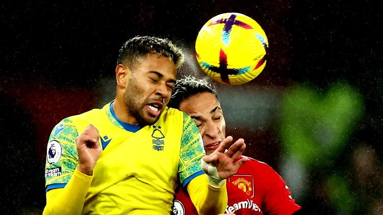 Renan Lodi and Anthony compete for the ball during the Manchester United vs Nottingham Forest match - Phil Noble/Reuters Phil Noble/Reuters