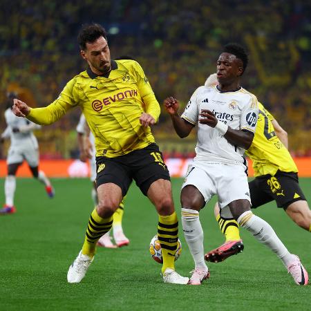 Hummels e Vini Jr. em ação na final da Liga dos Campeões, entre Borussia Dortmund e Real Madrid