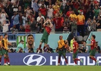 Coincidência? CR7 comemora gol na Copa em frente à faixa para Messi - Youssef Loulidi/Fantasista/Getty Images