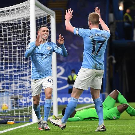 Phil Foden e De Bruyne comemoram segundo gol do Manchester City - Andy Rain/AFP