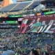 Mensagens políticas da torcida de Seattle marcam jogo contra o Botafogo