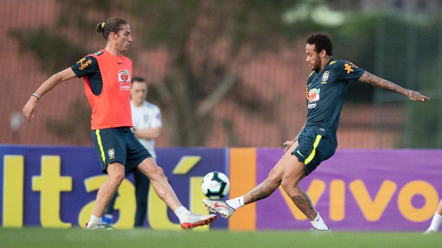 Filipe Luís e Neymar treinando juntos antes de o atacante se lesionar e ser cortado da Copa América - Lucas Figueiredo/CBF