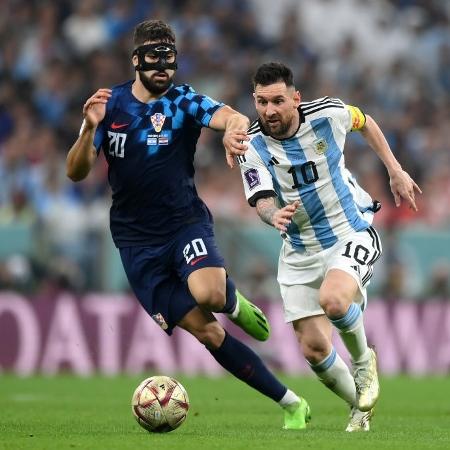 Josko Gvardiol e Lionel Messi em ação durante a semifinal da Copa do Mundo entre Croácia e Argentina - Divulgação/Copa do Mundo da Fifa