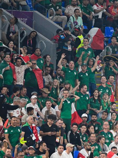 Torcedores do México durante jogo contra a Polônia na Copa do Mundo do Qatar, em Doha, no Estádio 974 - Alfredo ESTRELLA / AFP