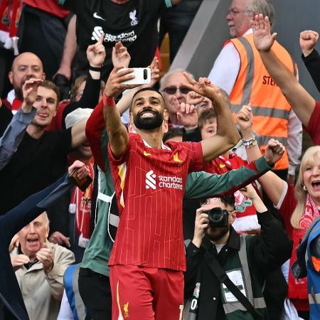 Mohamed Salah, do Liverpool, comemora gol contra o Tottenham pelo Inglês Mohamed Salah, do Liverpool, comemora gol contra o Tottenham pelo Inglês