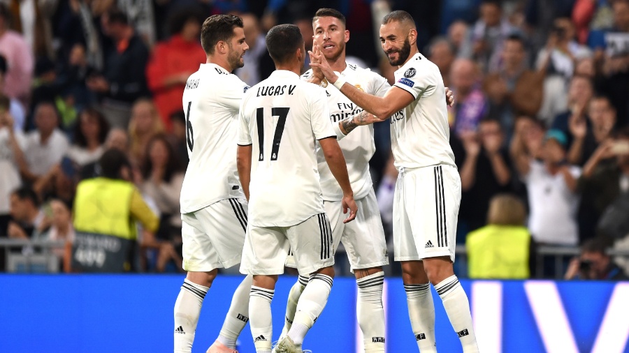 Jogadores do Real Madrid comemoram gol de Benzema sobre o Viktoria Pilsen - Denis Doyle/Getty Images