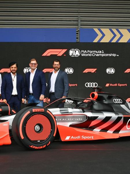 Os chefes da F1, da FIA e da Audi no anúncio de que a montadora entrará na F1 em 2026